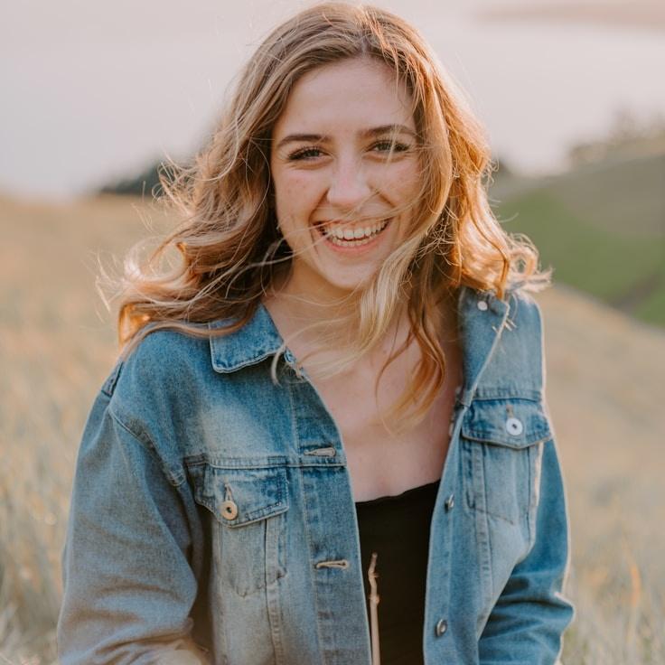 Kaveri Mehta, Lead Design Curator at Summit Flow Tech, reviewing corporate floral arrangements